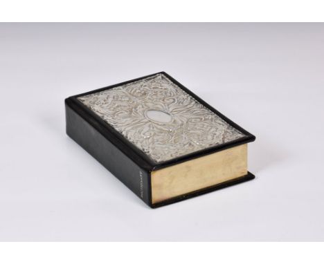 A silver mounted Oxford dictionaryJohn Bull Ltd., Sheffield 1990, the silver mounted cover heavily embossed with floral and f