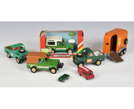 A boxed Britains 1/32 Farm 9512 Land Rover 90 County with Winch (M, box VG); together with three other unboxed Britains 1/32 