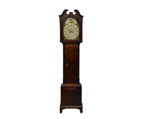 A late 18th century oak eight day longcase clock the bell strike movement fronted by a painted Roman arched dial with floral 