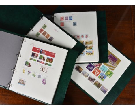 Philately interest -  Four stamp binders holding Eire &amp; Isle of Man stamps containing used and unused stamps, dating 1920