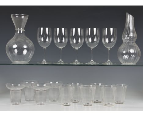 A set of four Lalique crystal dessert or coupé bowls signed 'R. Lalique France', in plain, clear crystal, cylindrical form wi