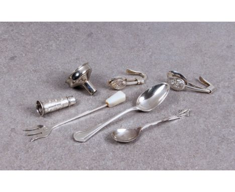 A pair of Channel Islands silver ormer shell napkin holders by Nina Paint together with a silver pickle fork; a silver mustar