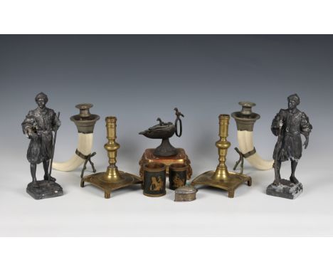 A small box of collectables including a pair of antique brass candlesticks; a pair of spelter Moorish figures; a brass Turkis