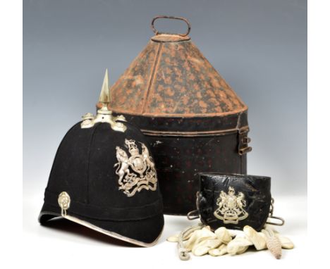 A Royal Engineers Volunteers Officers Home Service Helmet early 20th century, dark blue cloth body cork helmet with volunteer