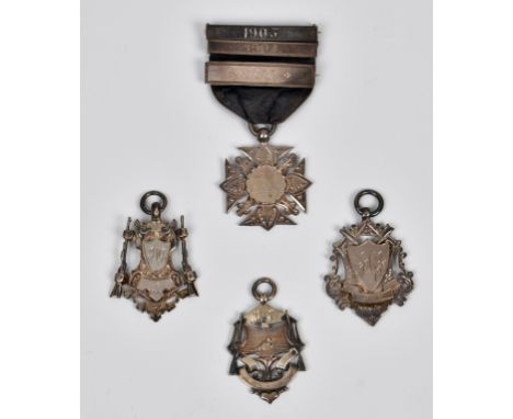 Royal Jersey Light Infantry interest - Four silver shooting medals awarded to J. JÉGU, the first of cross form, the centre in