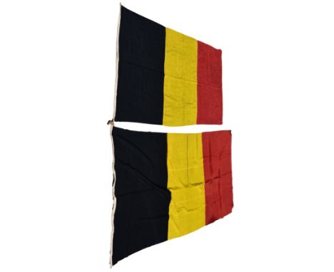 Two vintage cotton Belgian National Flags with wooden toggles, the largest measuring 56 x 103in. (142.2 x 261.7cm.) approxima