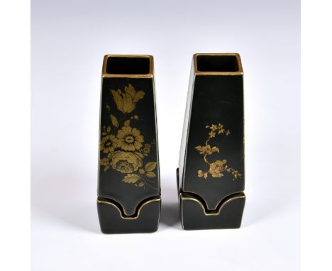 A pair of unusual Japanese vasesof tapering square form with shaped cut-out section to base area, the earthenware decorated w