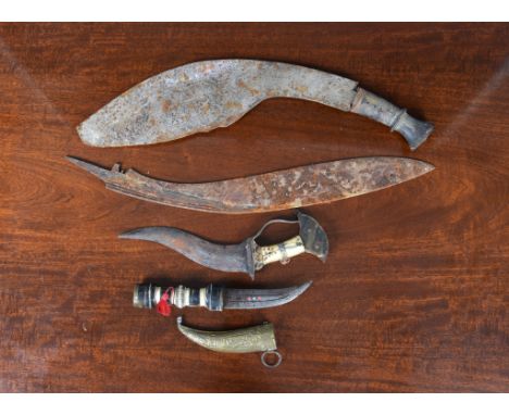 A South Indian dagger (khanjar) early 20th century, with recurving double-edged blade, bone grip with punched decoration, fla