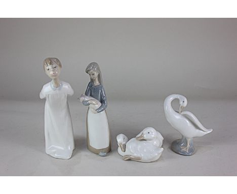 Three Lladro porcelain figures, a boy in a nightshirt, a girl with a piglet and a goose, together with a Nao group of two duc