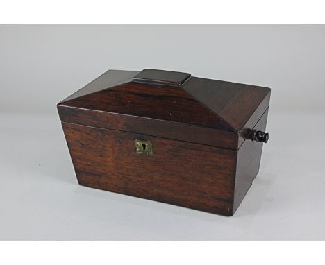 A 19th century rosewood tea caddy containing two zinc lined compartments 23cm wide