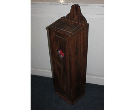 A stained pine stick stand box with sloping hinged top and hanging bracket, 87cm