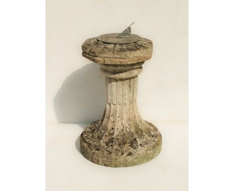 A sundial raised on a reconstituted stone stand - 47 cm diameter, 75 cm high