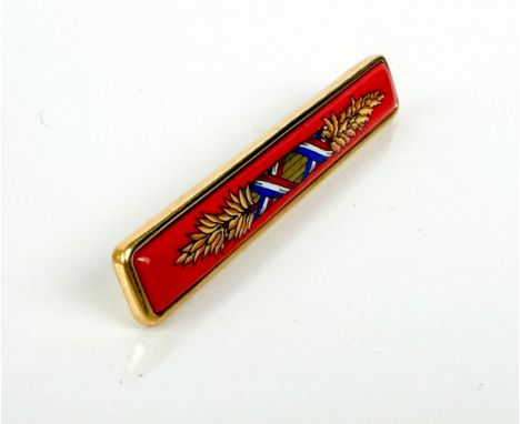 A vintage Herm&egrave;s red enamelled bar brooch - gold plated and red enamel with wheatear and French flag ribbon decoration