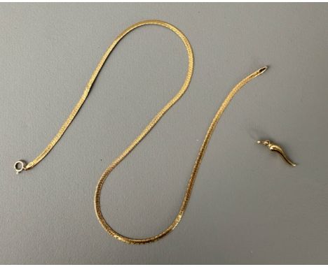 A vintage 9ct yellow gold necklace - Birmingham import hallmarks 1984, the flexible, necklet with bright cut decoration, 40.5