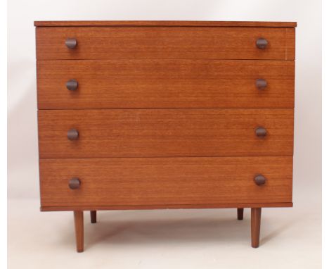 A vintage Avalon teak chest of drawers - with four flush graduated long drawers with shaped handles, raised on turned taperin