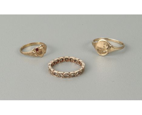 Two 9ct yellow gold signet rings - one with Birmingham hallmarks, size O/P; the other child's size, the heart-shaped face set