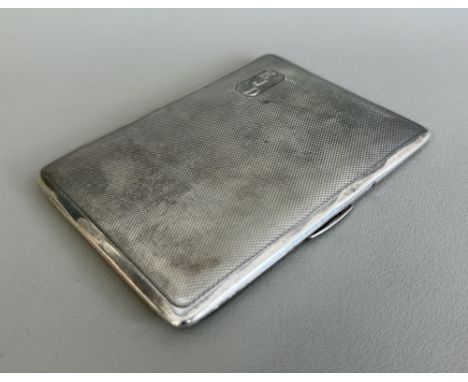 A George VI silver cigarette case - Smith & Bartlam, Birmingham 1942, rectangular with engine turned decoration, engraved ini