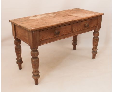 An early 20th century pine kitchen or scullery table with two side drawers - raised on turned supports. (LWH 127.5 x 59 x 76.