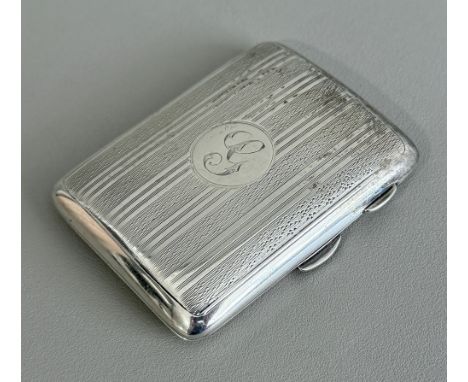 An Edwardian silver cigarette case - Colen Hewer Cheshire, Chester 1909, of rectangular cushion form, with striped engine tur