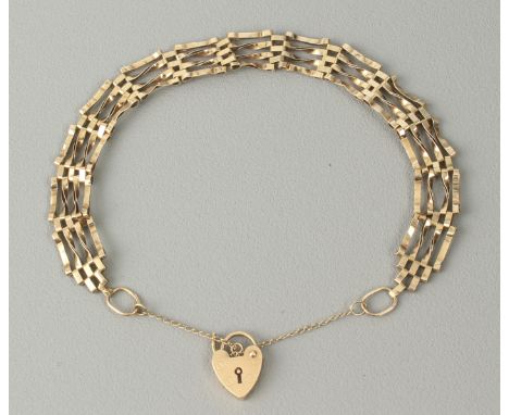 A 9ct gold gate link bracelet - with heart padlock clasp, hallmarked London 1985, 4.7g.