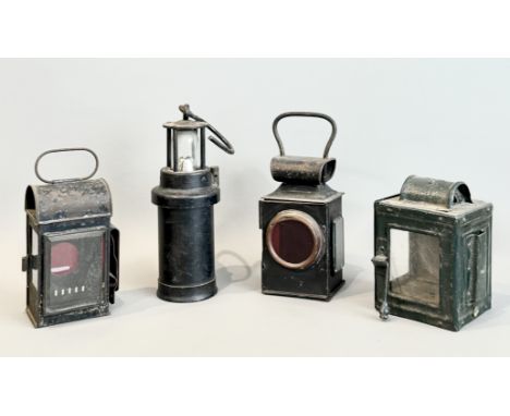 Three vintage railway / road lamps - first half 20th century, together with a CEAG miner's safety lamp. (4)