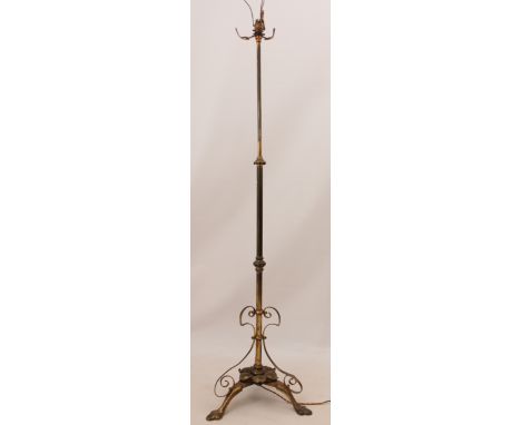 An Art Nouveau style brass standard lamp - height adjustable from 136cm to 170cm (to top of fitting).