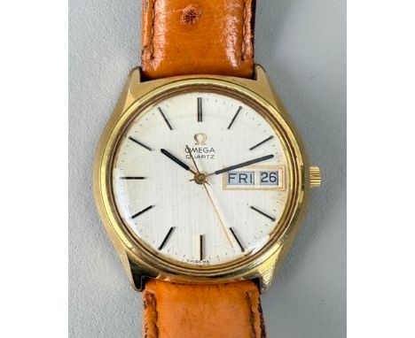A vintage Omega Quartz gents wristwatch - with 39mm gold plated stainless steel case, the silvered dial with gilt and black b