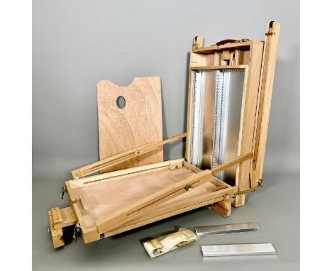 A light oak portable folding artist's easel and paints box with palette - with leather handle, brass plated hardware and shou