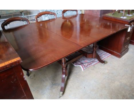 A George III style mahogany drop leaf dining table, 176cm extended width 119cm height 76cm