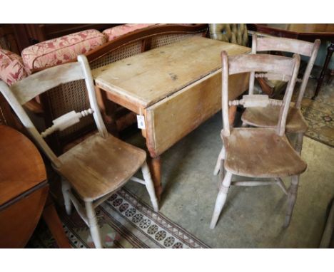 A Victorian pine Pembroke table, width 98cm and three Victorian Windsor chairs