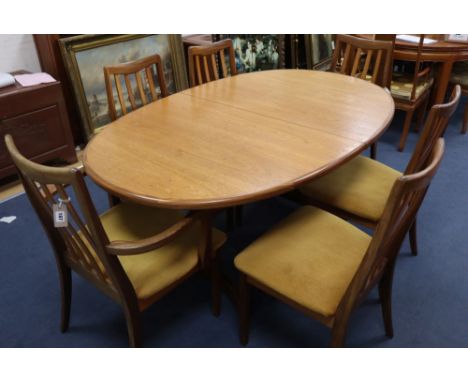 A G plan teak extending dining table, width 102cm, depth 106cm, height 69cm, six chairs and a sideboard