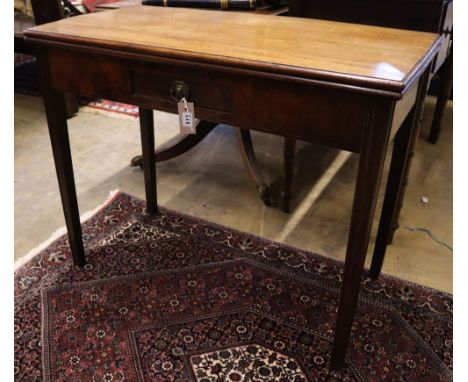 A George III rectangular mahogany folding tea table, width 91cm, depth 44cm, height 72cm