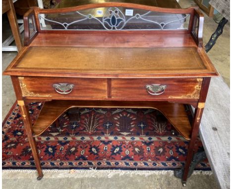 An Edwardian inlaid mahogany side table, the superstructure with an inset stained glass panel, width 95cm, depth 50cm, height