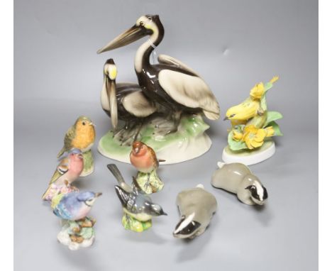 An Austrian Keramos group of pelicans, six Royal Worcester and other bird models and two Lomonosov porcelain badgers
