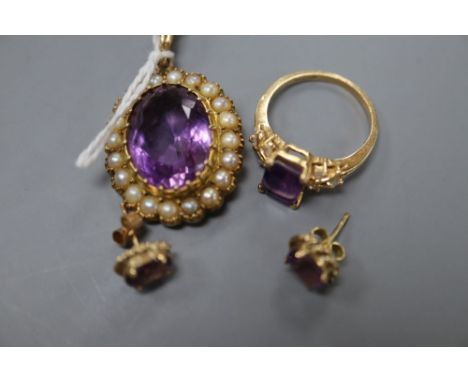 A modern 9ct gold, amethyst and seed pearl set oval pendant, a pair of 9ct and amethyst earstuds and a plated dress ring, 9ct