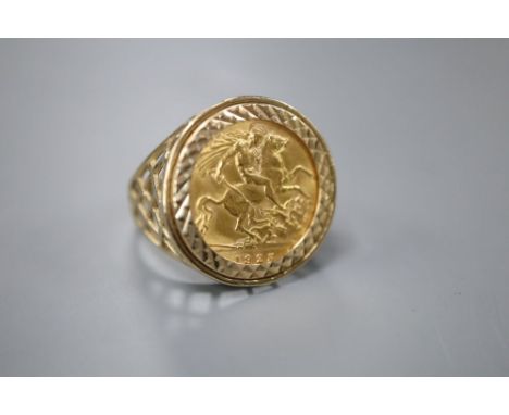 A George V 1925 gold half sovereign, now in 9ct gold ring mount, size V, gross 7.9 grams.