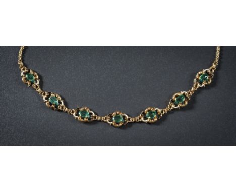 An enamelled and green tourmaline mounted necklace: with openwork links each inset with a single oval green tourmaline within