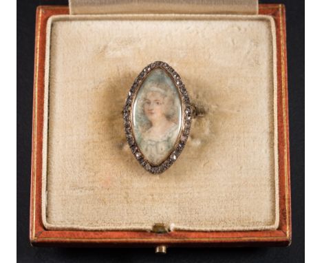 An early 19th Century gold and rose diamond marquise-shaped miniature portrait brooch: depicting a woman with blue eyes withi