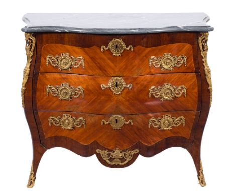 A late 18th Century Swedish kingwood, crossbanded and gilt metal mounted serpentine bombe commode:, bordered with boxwood lin