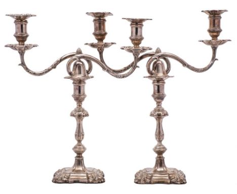 A pair of George V silver twin-branch candelabra, maker Joseph Rodgers &amp; Sons, Sheffield, 1935: initialled,  the urn-shap