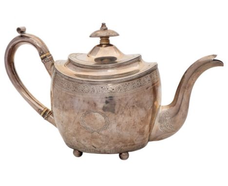 A George III silver teapot, maker Thomas Holland,  London, 1806: of barge-shaped outline, with banded foliate decoration, rai