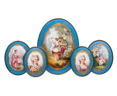 Five French porcelain oval plaques: in the Sèvres manner, two decorated with head and shoulder portraits of Mme. Antoinette a