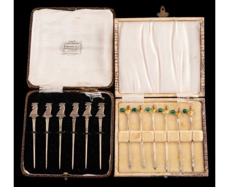 A set of six George V silver novelty cocktail sticks, maker James Dixon & Sons Ltd, Sheffield, 1928: with tapering stems, the