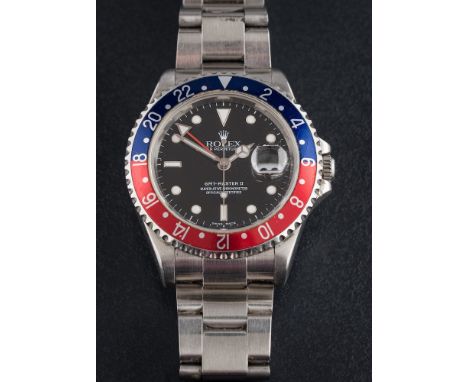 Rolex. A gentleman's stainless steel automatic Rolex GMT Master II 16710 'Pepsi' wristwatch: the black dial with luminous dot