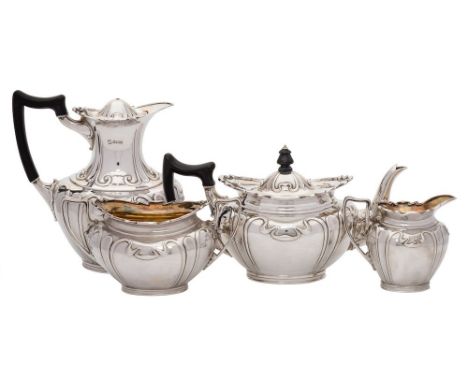 An Edwardian silver four- piece tea and coffee service, maker Martin, Hall &amp; Co, Sheffield,  1904/1905: of oval outline, 