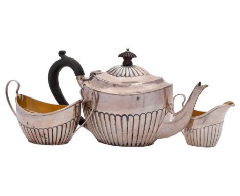 A Victorian silver three-piece batchelor's tea service maker Plante & Co, Birmingham, 1894:  of oval form with half reeded de