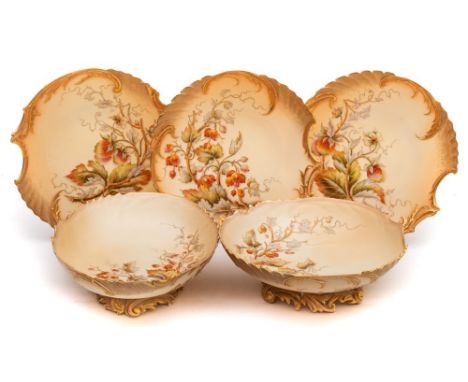 A Royal Worcester fruit painted blush ivory porcelain dessert service: of leaf form painted and gilded with branches of fruit