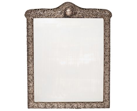 A large Victorian embossed silver mounted easel dressing table mirror, maker Henry Matthews, Birmingham, 1897: monogrammed, o