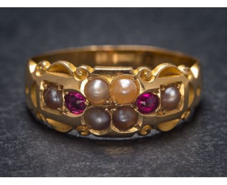 A 19th Century ruby and seed pearl eight-stone ring: approximately 3.5gms gross weight, ring size N.  