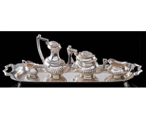An Elizabeth II silver miniature tea and coffee service, maker A Marston & Co, Birmingham, 1968: with half reeded decoration,